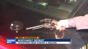 Two guns from suspected carjackers