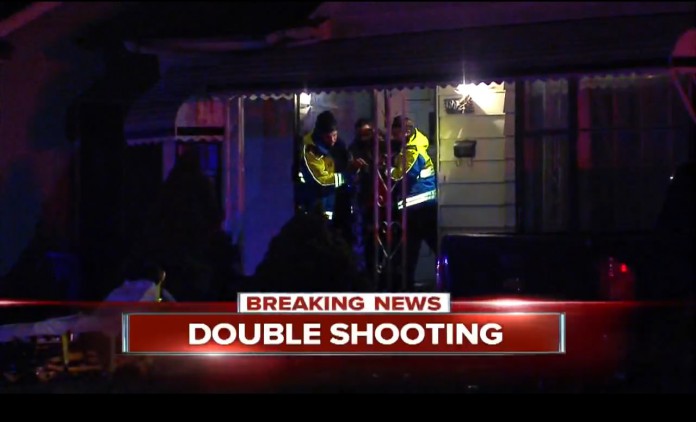 detroit_twoShot_westSide_biltmore Man being treated by EMT